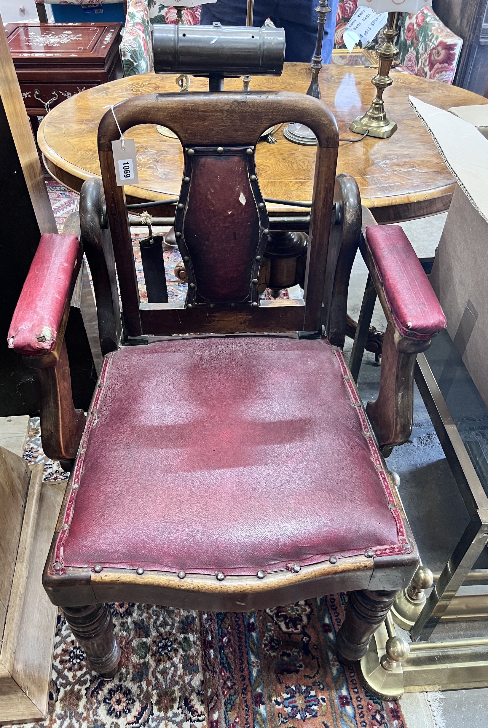 A late Victorian patent barber's chair, width 59cm, depth 62cm, height 100cm